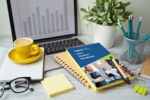 BMP student handbook on a desk